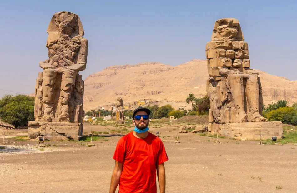 The Colossi of Memnon are two massive stone statues of the Pharaoh Amenhotep
