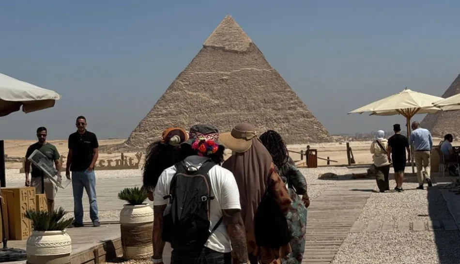 Family exploring Giza Pyramids on Hurghada day tour