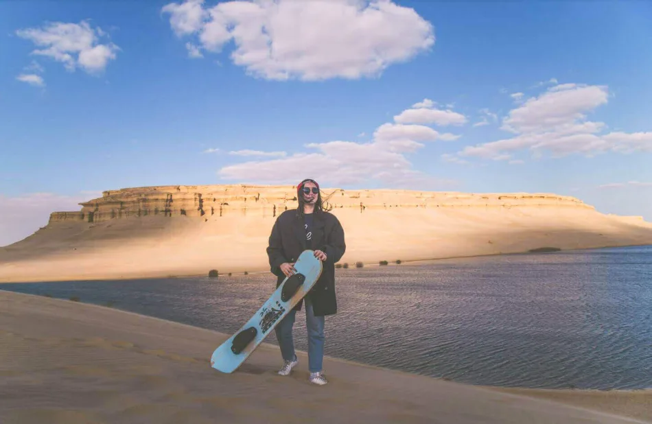 Practicing sand skating in Fayoum
