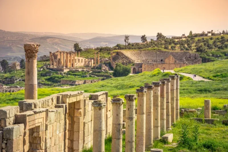 Scenic view of Amman city, and ancient ruins under a clear sky