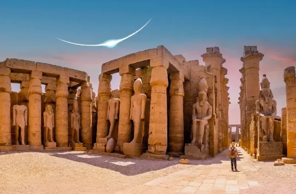 Egypt Solar Eclipse casting shadows on Luxor Temple