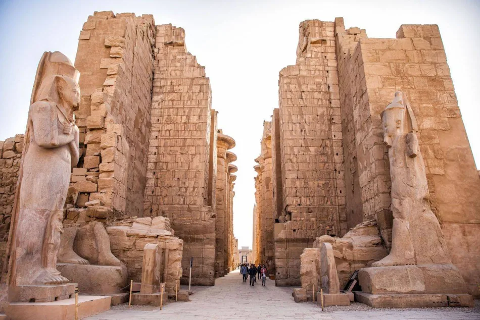 Karnak Temple complex in Luxor, Egypt, featuring towering columns and ancient hieroglyphs
