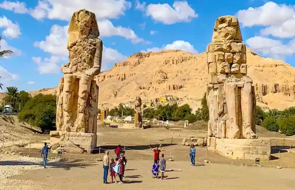View of the Colossi of Memnon in Luxor, Egypt, showing the two massive ancient statues