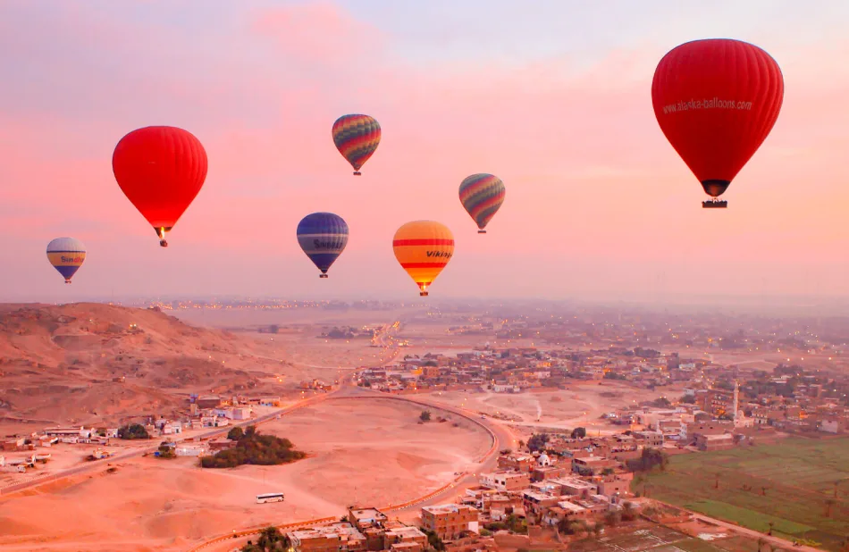 Fly over Luxor at sunrise in a hot air balloon